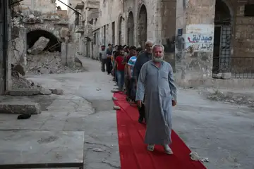 Public gathering at a Syria Mobile Film Festival event