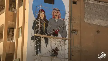 Close view of a mural created in the streets of Raqqa