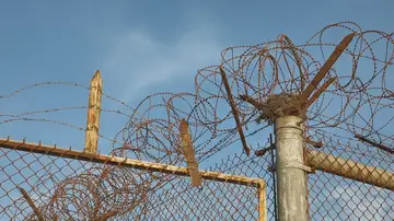 Barbed wire and fencing at Camp Bucca in southern Iraq