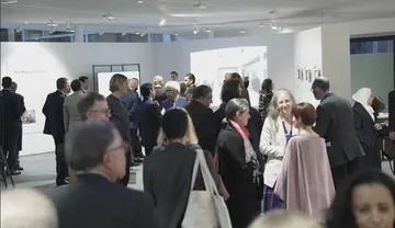 Visitors at the Prisons Museum exhibition during the Syria in Transition series at UNESCO headquarters, Paris