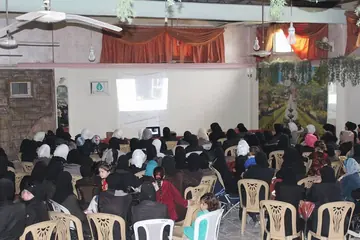 Syria Mobile Film Festival screening for an audience in besieged Eastern Ghouta in 2016