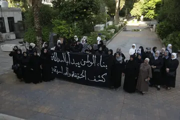 Families of missing people at the Syria Prisons Museum launch in Damascus